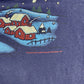 DELTA Character T-Shirt